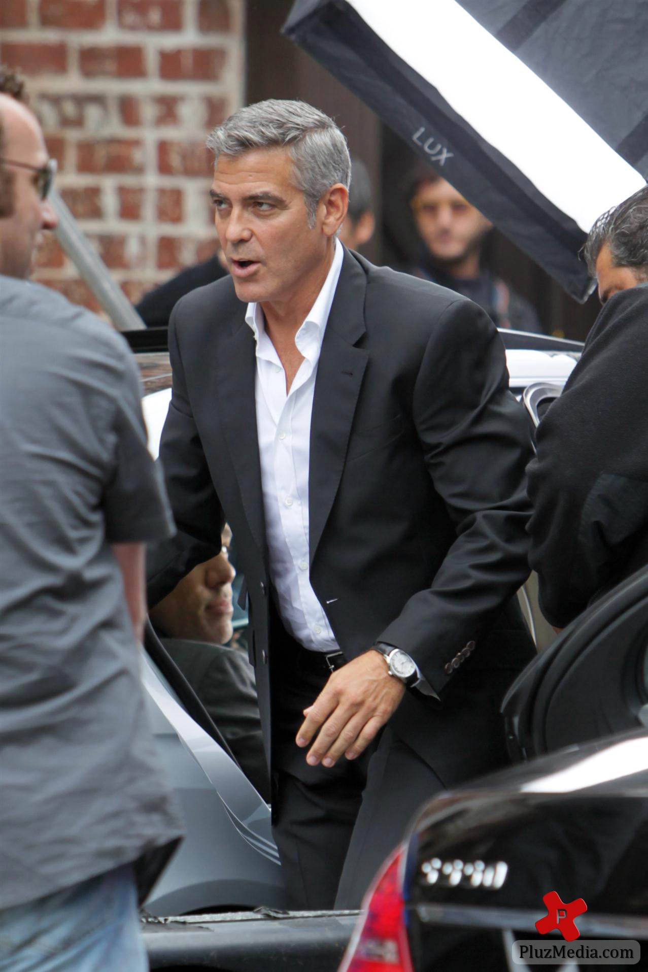 George Clooney on the set of a Mercedes Benz E300 L advert photos | Picture 78303